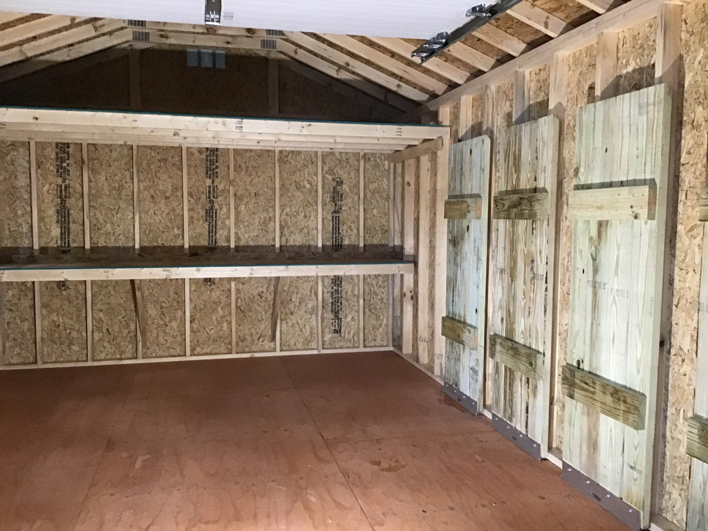12X16 Farm Garage Storage Package With Wood Panel Siding Located in Byron Minnesota