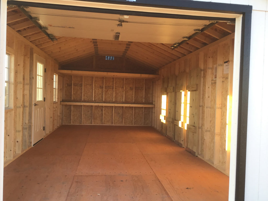 12X24 Farm Garage Storage Package With Wood Panel Siding Located in Stewartville Minnesota