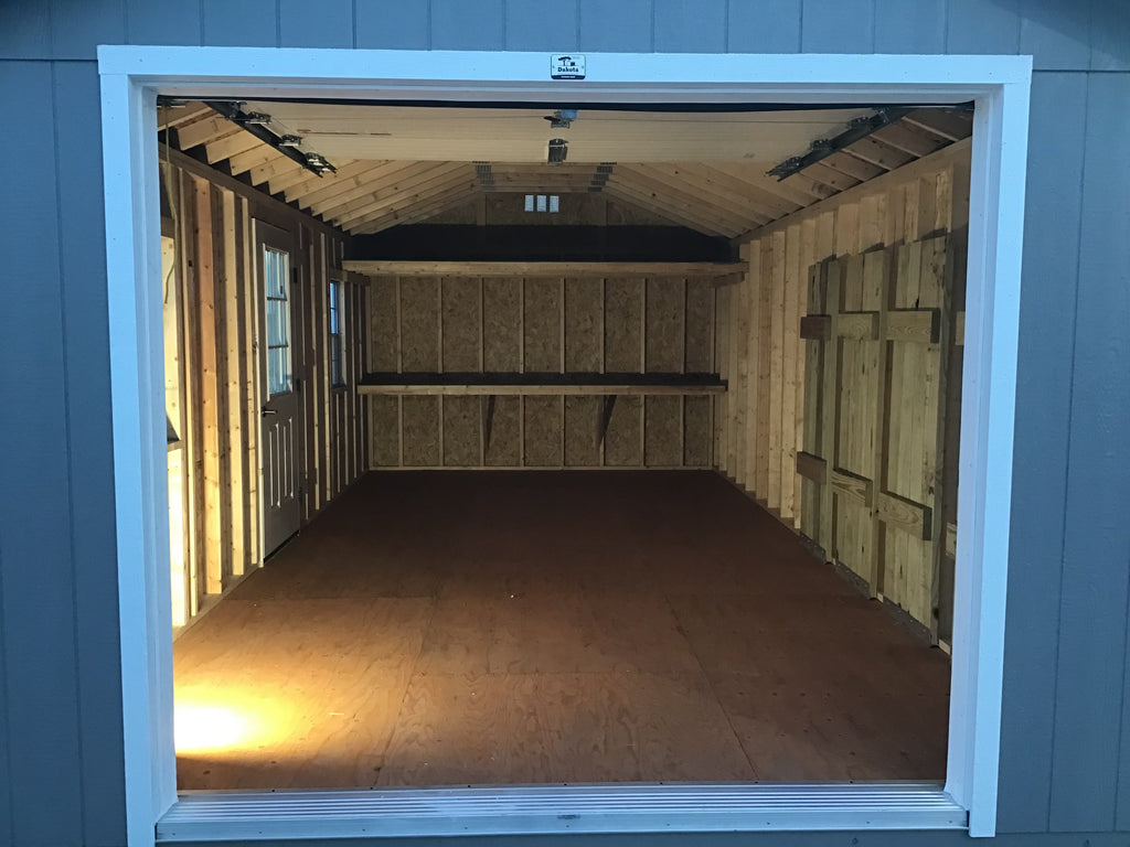 12X24 Farm Garage Storage Package With Wood Panel Siding Located in Milbank South Dakota