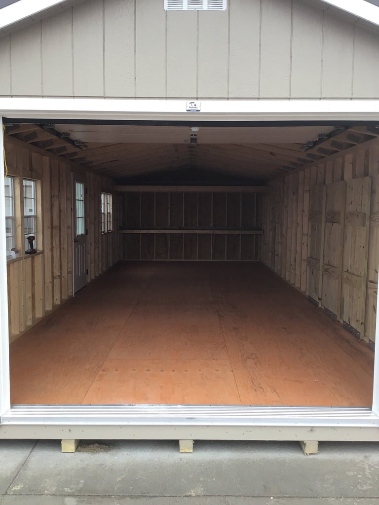 14X32 Farm Garage Storage Package With Wood Panel Siding Located in Brookings South Dakota
