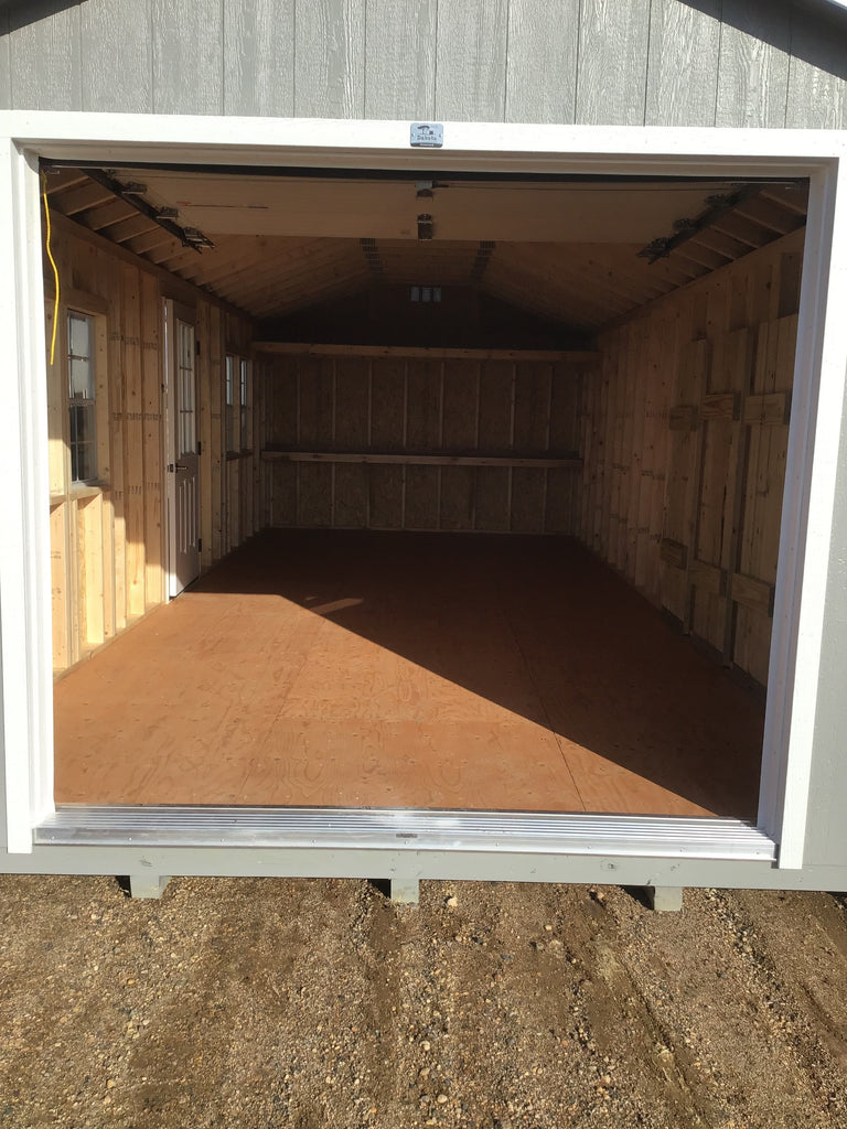 12X28 Farm Garage Storage Package With Wood Panel Siding Located in Deerwood South Dakota
