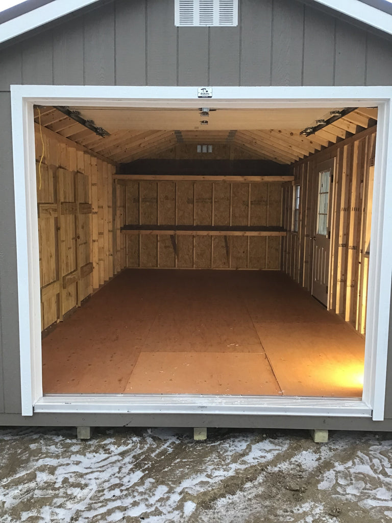 12X24 Farm Garage Storage Package With Wood Panel Siding Located in Litchfield Minnesota