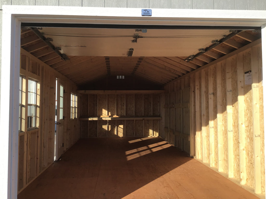 12X28 Farm Garage Storage Package With Wood Panel Siding Located in Jenkins Minnesota