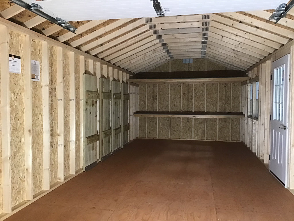 12X28 Farm Garage Storage Package With Wood Panel Siding Located in Milbank South Dakota