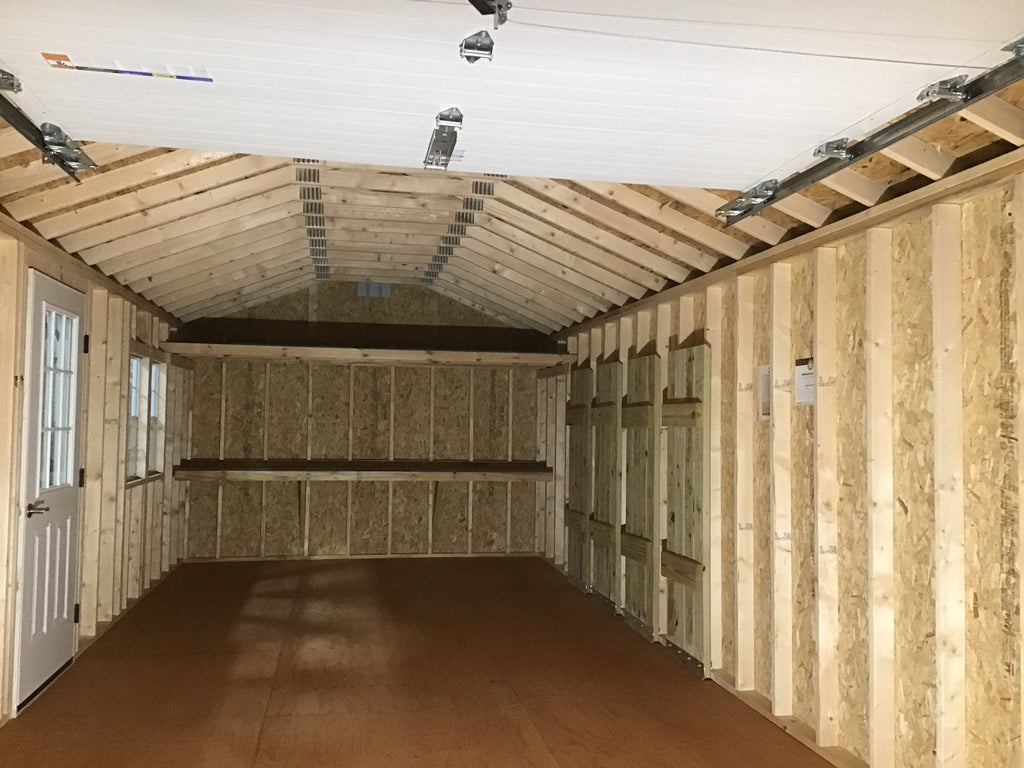 12X28 Farm Garage Storage Package With Wood Panel Siding Located in Milbank South Dakota