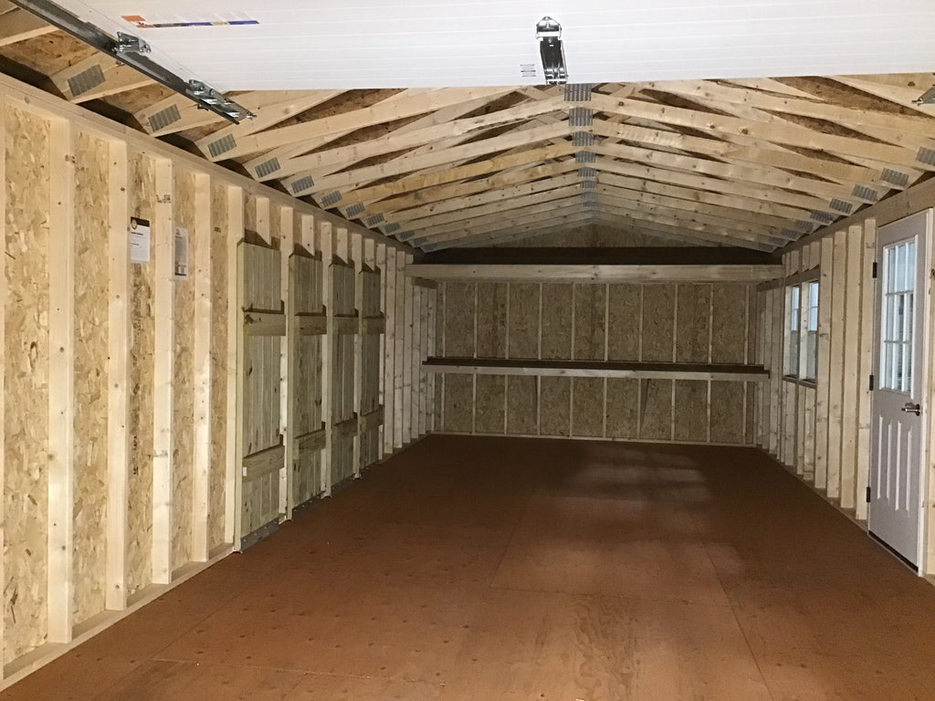 14X32 Farm Garage Storage Package With Wood Panel Siding Located in Aberdeen South Dakota