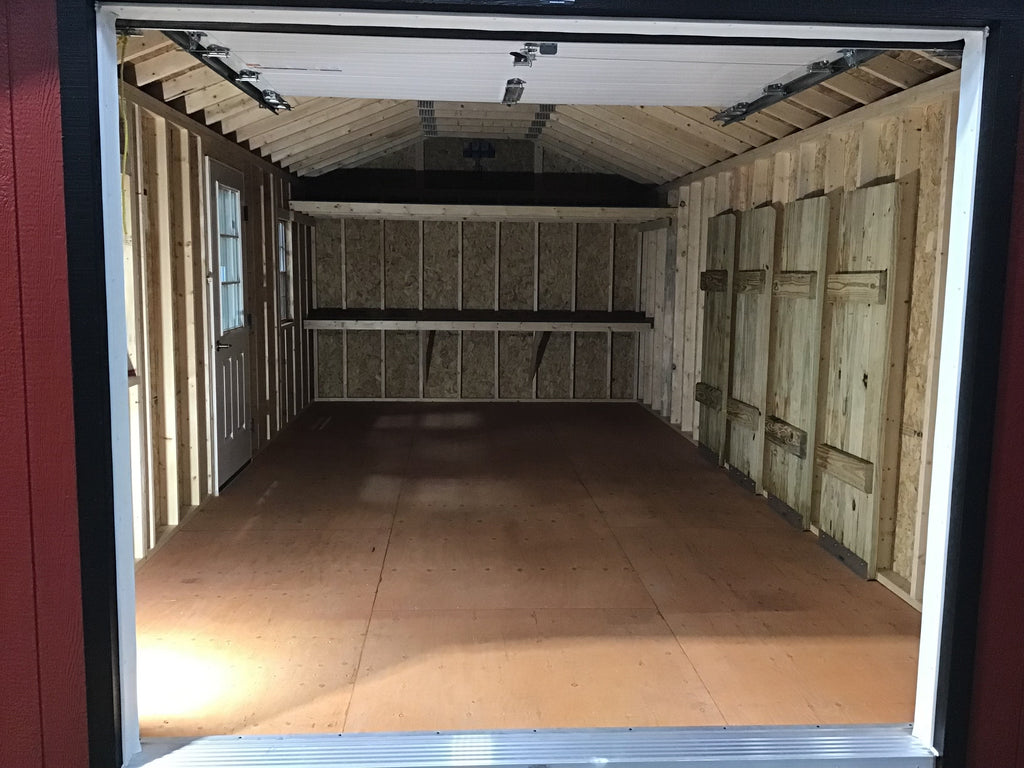 12X24 Farm Garage Storage Package With Wood Panel Siding Located in Madison South Dakota