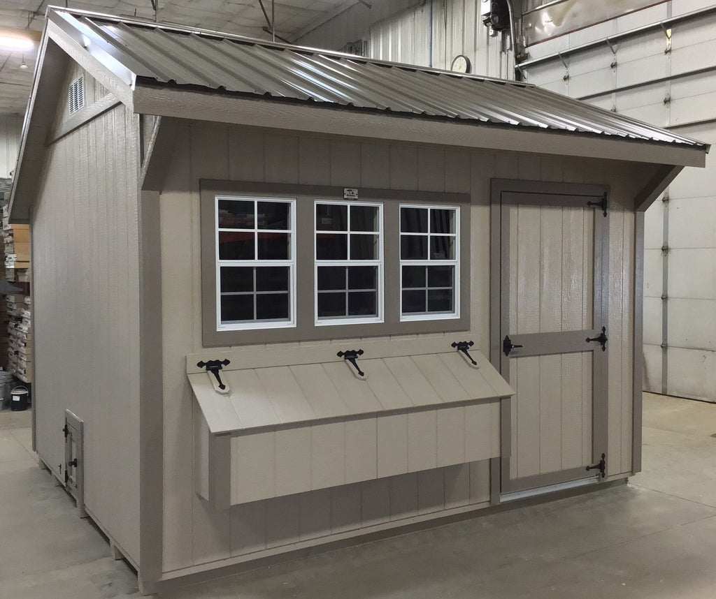 10X12 Free Range Coop With Wood Panel Siding Located in Worthington Minnesota
